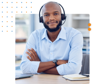 Man sitting at desk wearing a headset