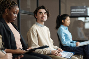 high potential job candidate waiting with job resume for interview