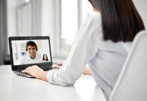 HR professional video interviewing a job hopper