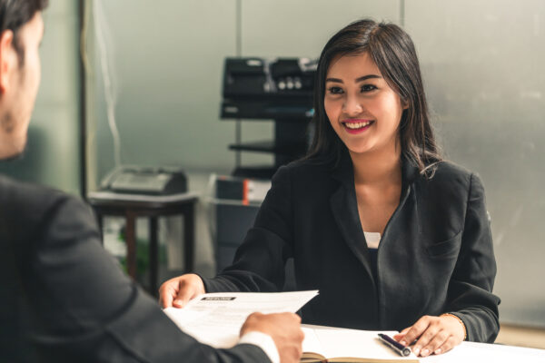 Hiring manager HR evaluating candidate resume in job interview