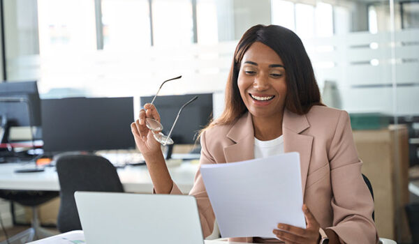 professional reviewing employee motivation assessments to improve employee retention